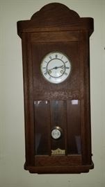Oak Junghans, porcelain dial. RA pendulum, 3 windows in door