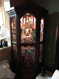 large lighted curio cabinet
