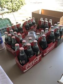 Collector coke bottles unopened 4 are 6 pack 2 are 5 pack nice 