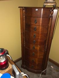 Large jewelry armoire and lots of jewelry sold separately 