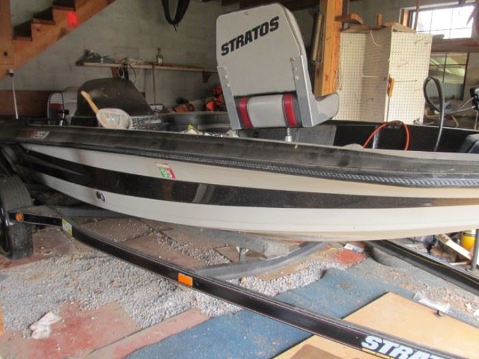 Stratos 255V fishing boat with trailer (needs new tires). 1989-90, 15-1/2' long. 