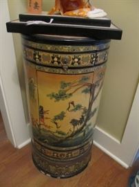 Small cylindrical stand cabinet