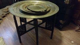 One of several tray tables with folding bases and tray tops