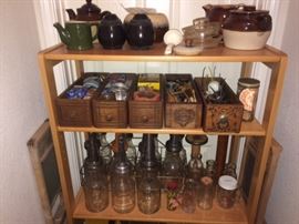 sewing cabinet drawers and oil bottles with a holder