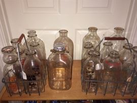 old milk bottles and carriers