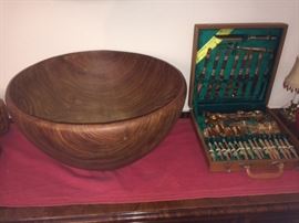 large teak bowl and bronze flatware