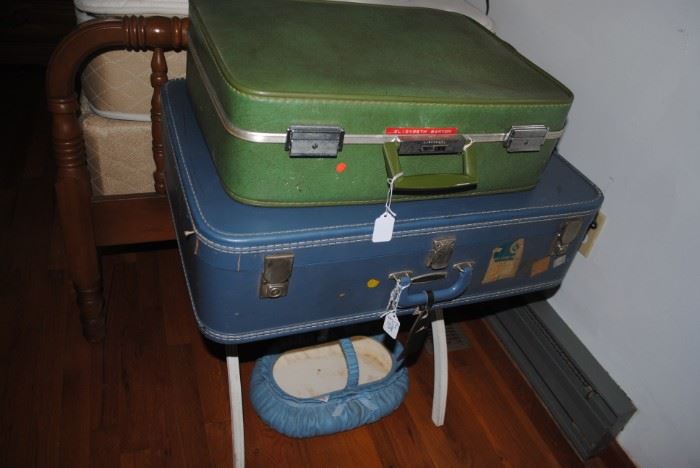 Vintage suitcases and luggage stand