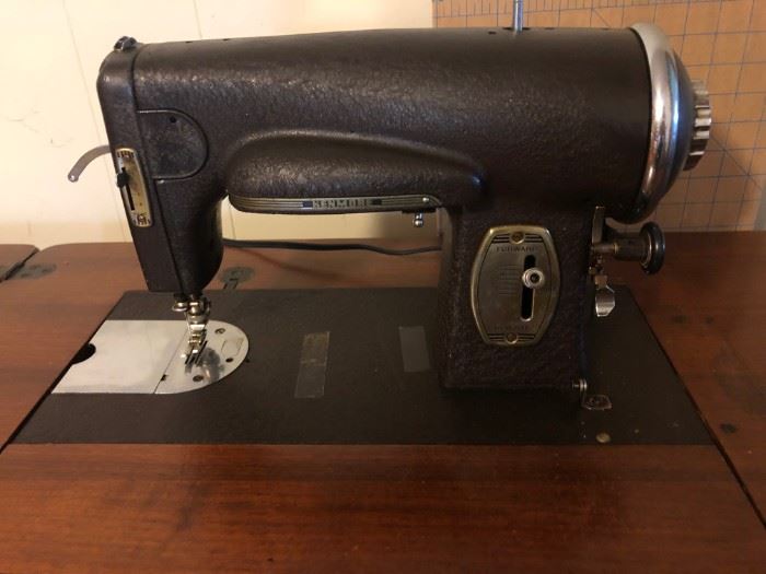 Kenmore sewing machine 40/50s ?   Has book and even the original guarantee!!  Also bobbins, attachments and extra bulbs  