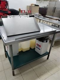 48" x 30" Stainless steel table with green painted steel under shelf & galvanized legs $95