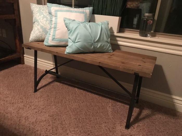 Wooden bench with iron legs 