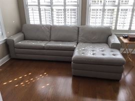 Gorgeous grey leather sectional by Haverty’s
