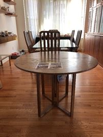 Table extensions measure 42" x 28.5" and be used as stand alone table (s)    Sold with dining room table