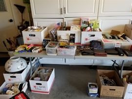 Tons of garage items, bulbs, tools, tape, cleaners, etc.