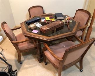 Octagonal game table with four chairs