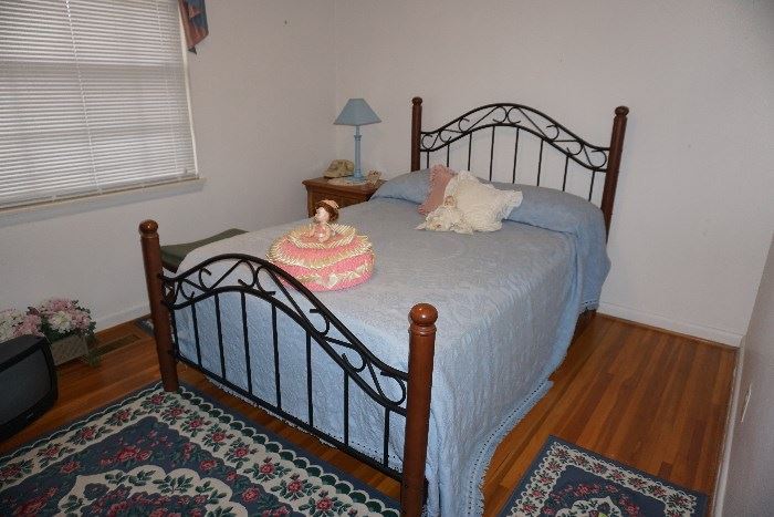 Full bed, vintage phone, night stand, lamp, doll, area rugs
