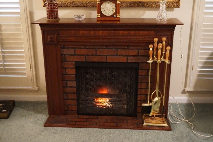 Freestanding electric fireplace by Harris Systems Inc. Skokie Illinois., Like new fireplace tools