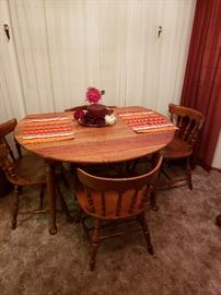 Ethan Allen dining table wit four chairs