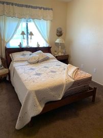 Maple full size headboard, matching nightstands and like new mattresses. Quilt, pillows and matching curtains
