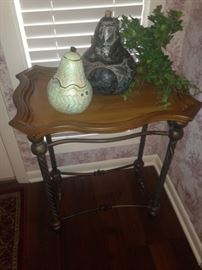 Small side table; pear-shaped hand-painted lidded bowls