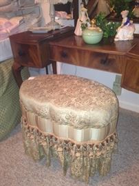 Padded fabric vanity stool with trim