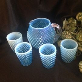 Fenton blue opalescent hobnail juice pitcher and four glasses