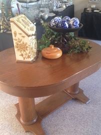 Antique oval top table with double pedestal base