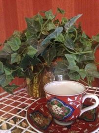 One of many cups and saucers