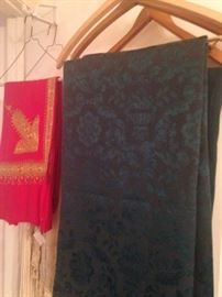 Assorted sizes and colors of table cloths