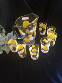 Retro yellow and polka dot pitcher and glass set