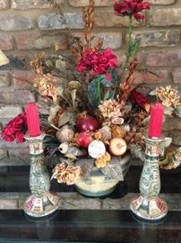 Two candle holders; floral arrangement
