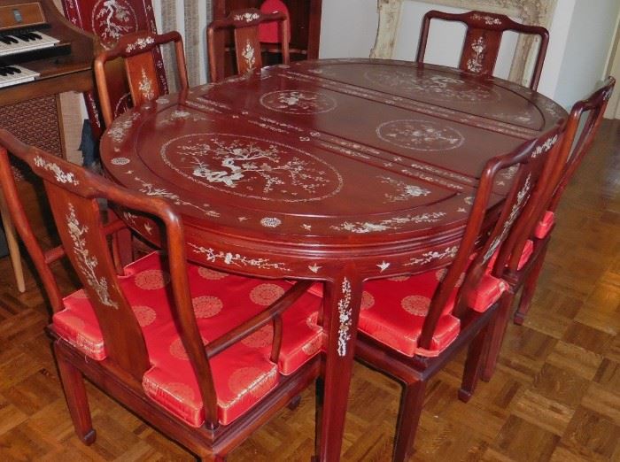 Rosewood, mother of pearl inlaid dining table with 6 chairs and 2 leaves