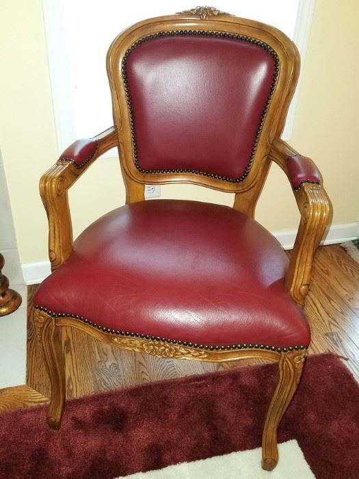 Carved armchair with red genuine leather upholstery $100 available now!