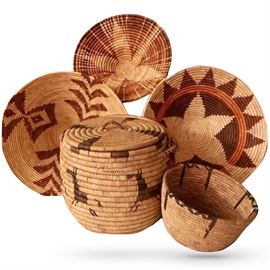 A few Native American baskets, many coiled, some twined