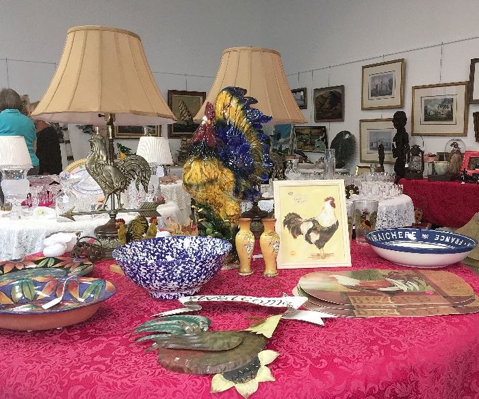 Americana tables include rooster lamps, ceramic and metal roosters and two 1969 Dante Distillery ceramic flasks — one with CA quail and one with a prairie chicken — and a Pat Espey bowl and plate.