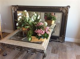 Coffee table with iron legs, ornate mirror