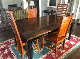 Antique solid wood dining table with leaf with high-back ladder chairs