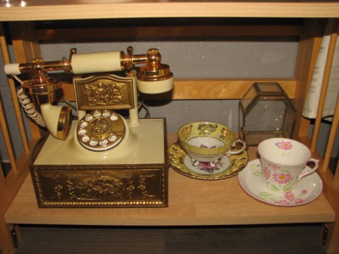 vintage French princess telephone, teacups & saucers