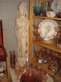buddha statue, timepieces, depression glass