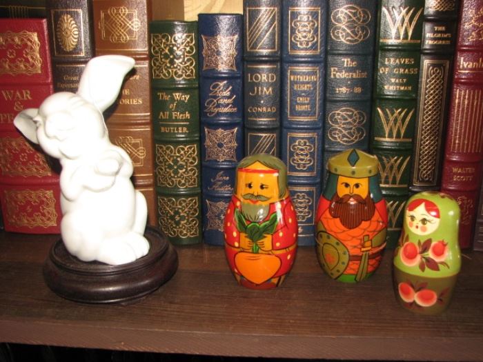 Russian nesting dolls, leather bound books