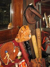 vintage baseball gloves, mitts, bats