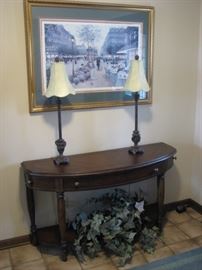 Demilune entry table, 2 candlestick lamps, Parisian art scene