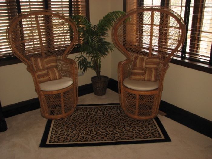 Peacock wicker chairs, cheetah rug
