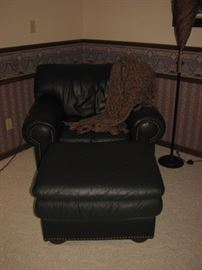 Green leather chair & ottoman with brass nailheads