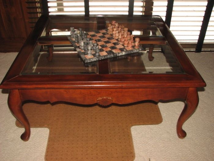 chess set, glass top coffee table