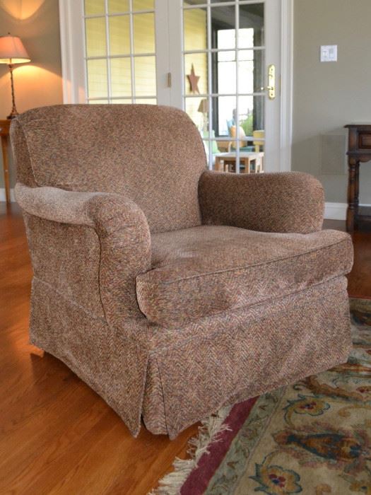 One of two Furniture Guild swivel chairs