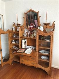 Lots of nice glass. Sorry this piece of furniture goes with family