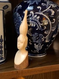 Hand carved bone figure head