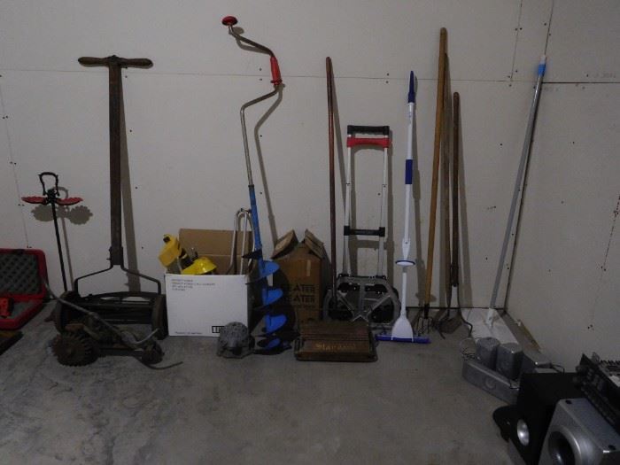 traveling sprinkler, antique push mower, seat heater, bissell sweeper