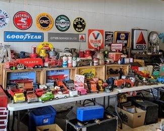 Selection of vintage and reproduction gas and oil signage. vintage toys and more!