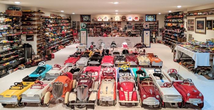 Over 100 pedal cars; including vintage professionally restored cars! Featuring very scarce cars that rarely come up for sale.